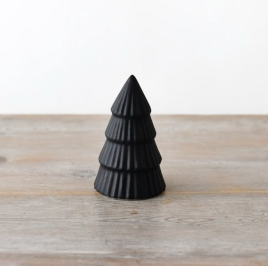 Matt Black Tree Ornament Small, ridged black cone tree standing alone on a pale wooden surface