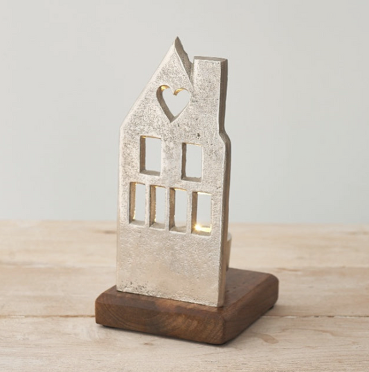 Metal House Tealight Holder On Wooden Base, cream metal house with window cut-outs, front view