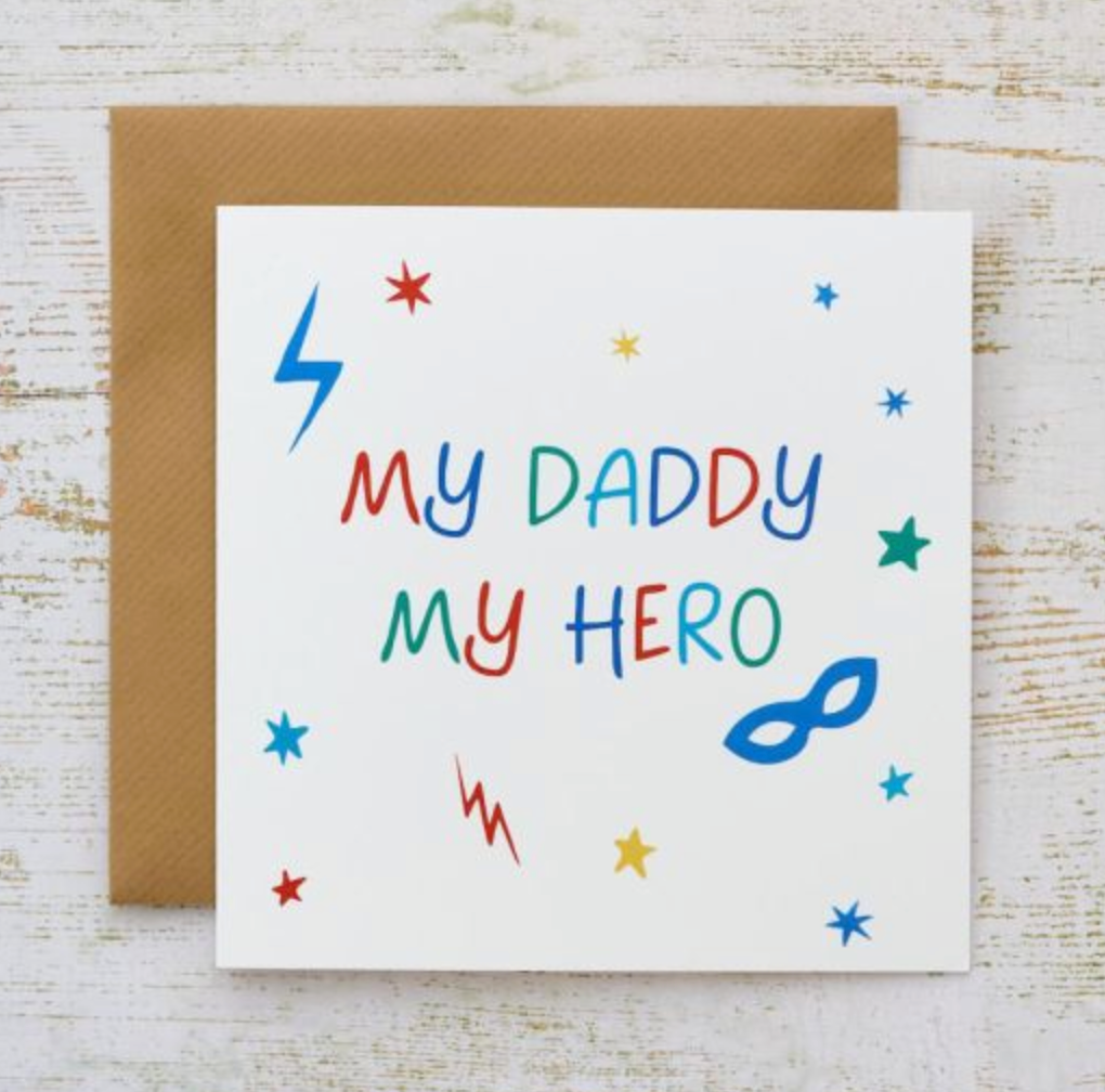 My Daddy My Hero greetings card with colourful lettering, stars and a lightning bolt, with a kraft envelope