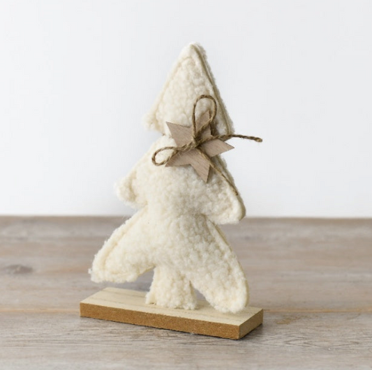 Sherpa Christmas Tree on Wooden Base, cream textured tree with twine bow, on a table