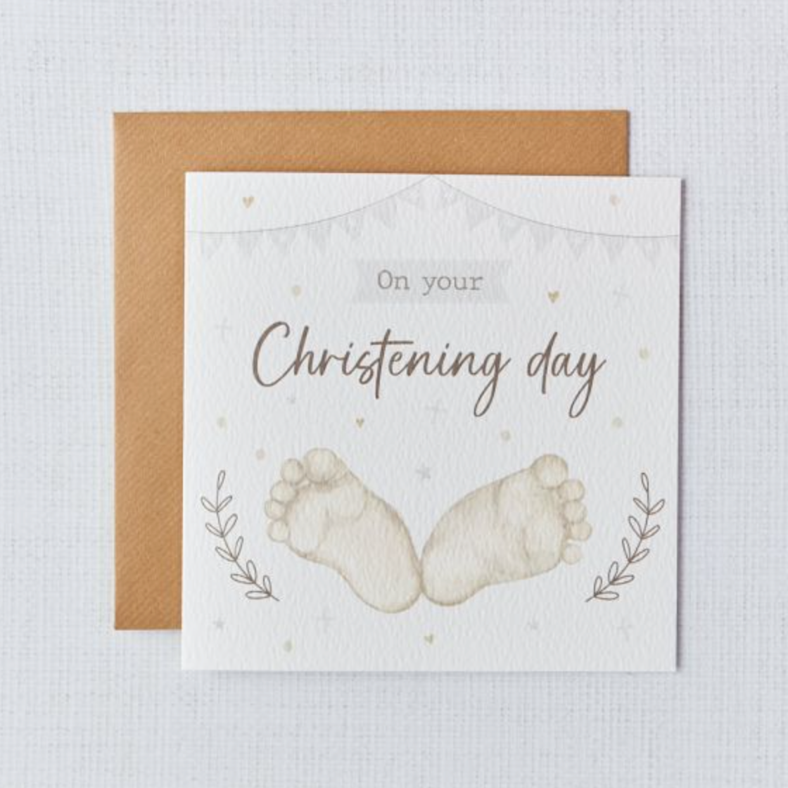 Baby Christening Card, a white card with Christening day script and tiny baby footprints, with kraft envelope