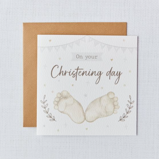Baby Christening Card, a white card with Christening day script and tiny baby footprints, with kraft envelope
