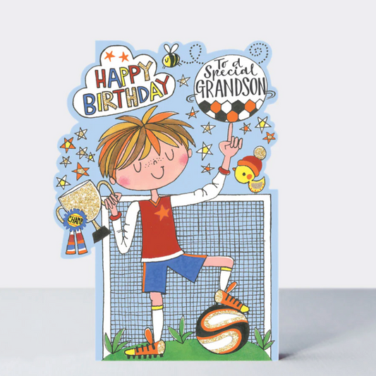 Grandson Football Birthday Card, a die-cut greetings card with a boy footballer in red and a goal