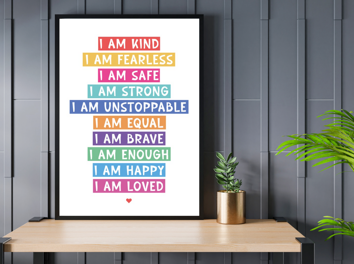I Am Affirmation Colour print in a black frame on a wooden console against dark panelled walls