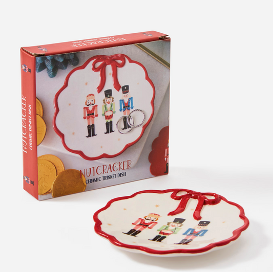 Nutcracker Trinket Dish With Bow shown in its gift box, on white