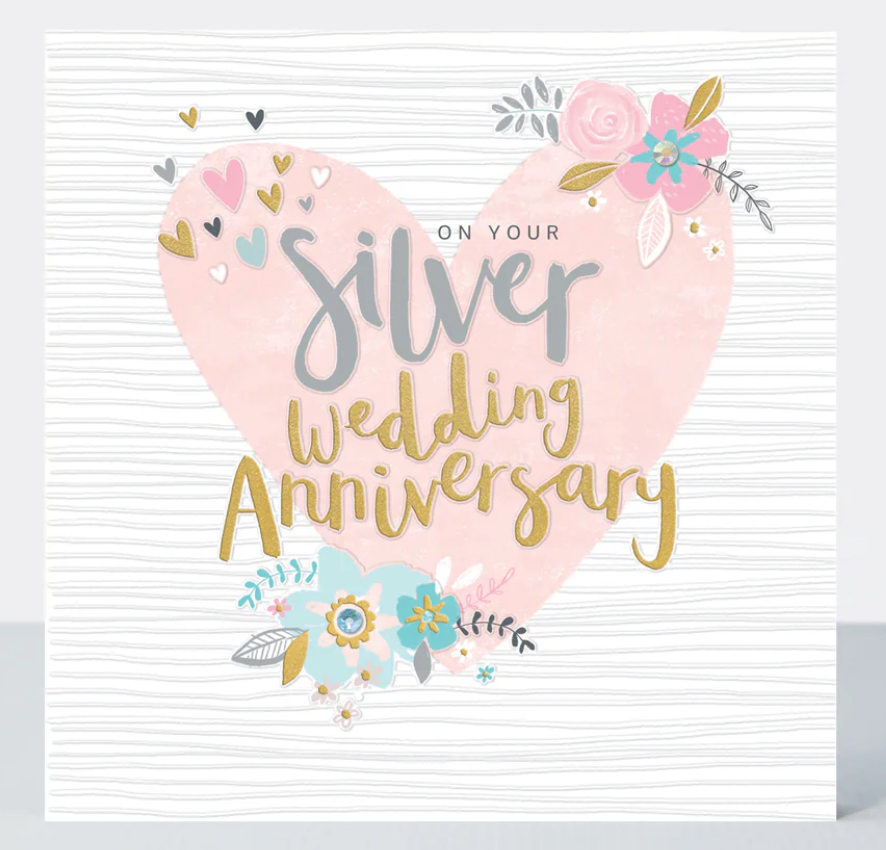 On Your Silver Wedding Anniversary card with silver and gold lettering on a pink heart with flowers