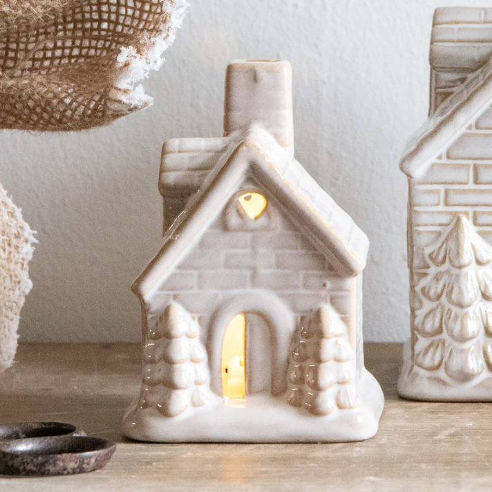 Reactive Glaze LED House - Small, cream ceramic house lit from within beside the larger house
