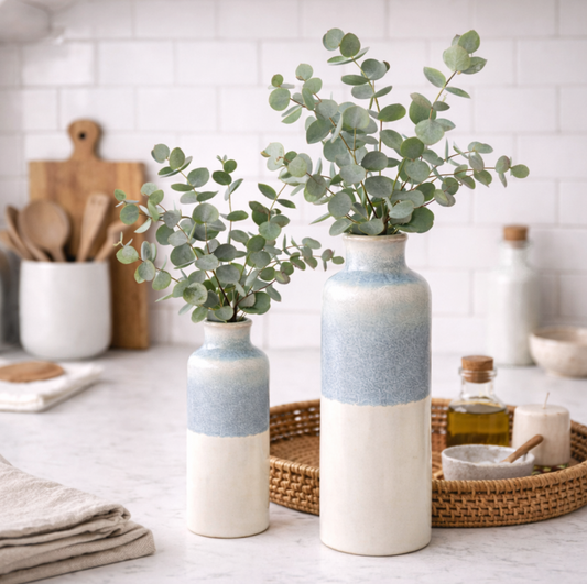 Serene Blue Reactive Glaze Vase, Large with eucalyptus on a kitchen worktop